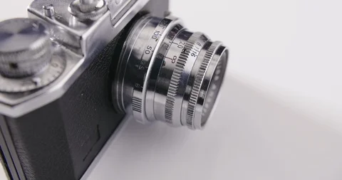 Lockdown Shot Of Old Fashioned Camera On Table Stock Footage 86085018