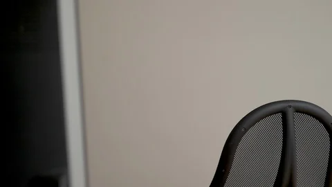 Lockdown shot of pretty young executive sitting on her desk to work on computer Stock Footage 114872568