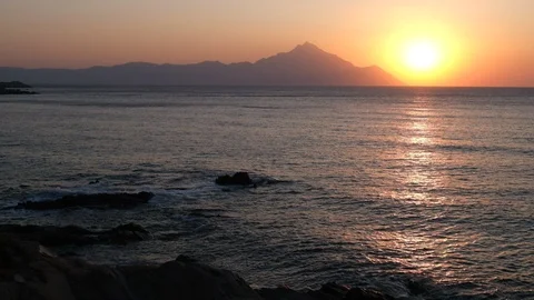 Lockdown shot of sea and mountain at sunset time Stock-Footage 122401153