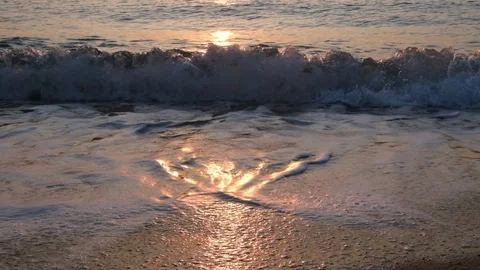 Lockdown shot of sea waves reaching on shore in slow motion Stock Footage 122472572