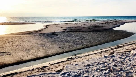 Lockdown shot of tide pools on the beach Video stock 114885152