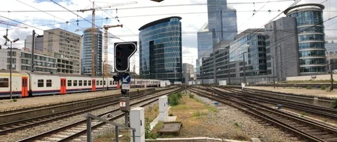 Lockdown shot of train running on the tracks in the city Stock Footage 122398730