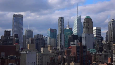 Lockdown Shot Of Various Tall Buildings And Skyscrapers Against Cloudy Sky - New Vídeos de archivo 237040165