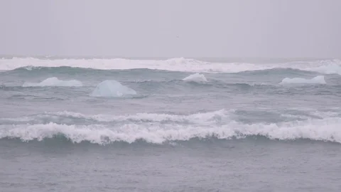 Lockdown shot of waves flowing through glaciers Stock Footage 118654527
