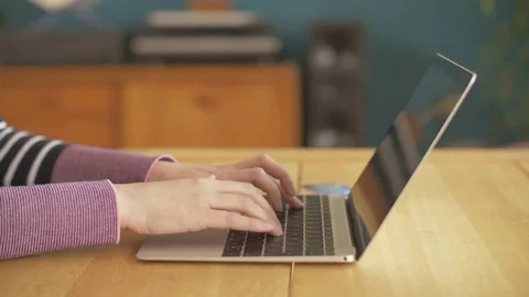 Lockdown Shot Of Woman Using Laptop And Credit Card Stock Footage 79678555