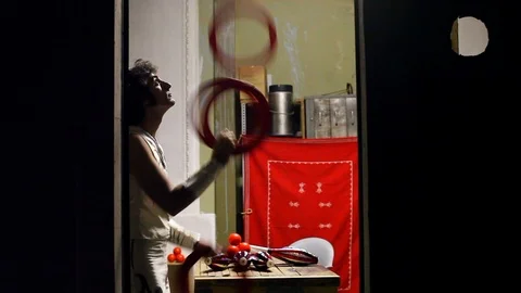 Lockdown shot of young man juggling Stock Footage 120434390