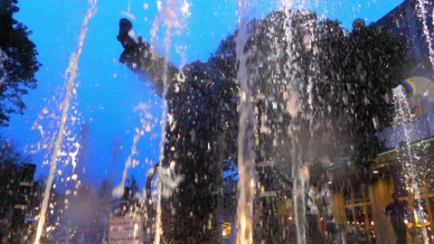 Lockdown Slow Motion Low Angle View Of Water Fountain In Park At Night - Los Video stock 276312951