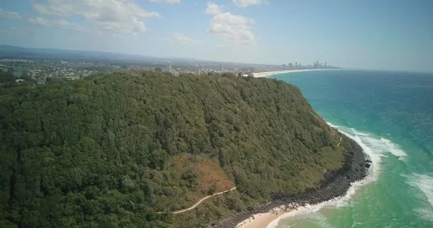 Lockdown till down shot of sea by mountain against sky Stock Footage 122457881