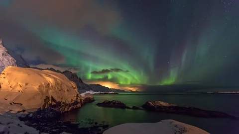 Lockdown Time-lapse of Dancing Green Aurora Borealis Sky in Hamnoy Norway - Stock Footage 109405950