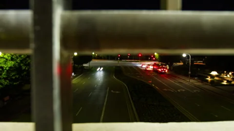 Lockdown Time Lapse Defocused View Of Cars Moving On Roads Seen From Railings At Stock Footage 297590097