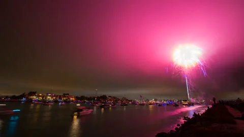 Lockdown Time Lapse Scenic Shot Of Fireworks By Nautical Vessels Moving On River Stock Footage 282318961