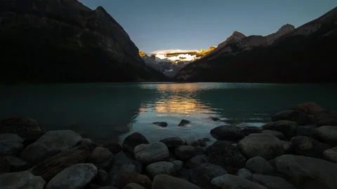 Lockdown Time Lapse Scenic View Of Rocks By Lake Surrounded By Snowy Rock Stock Footage 160314935