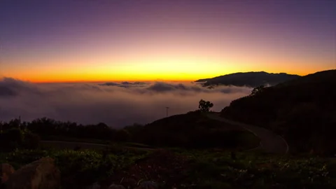 Lockdown Time Lapse Shot Of Beautiful Fluffy Clouds Over Mountains During Stock Footage 206320461