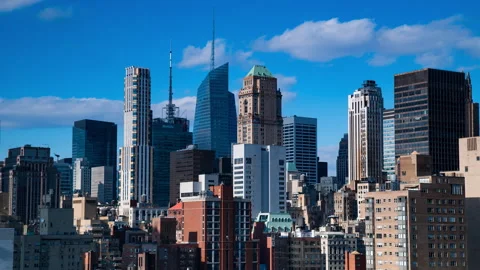 Lockdown Time Lapse Shot Of Buildings And Skyscrapers Against Blue Sky In City - Vídeos de archivo 237077913