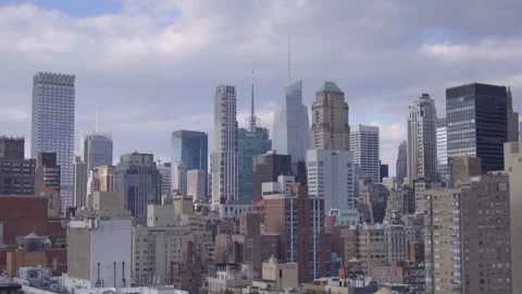 Lockdown Time Lapse Shot Of Modern Skyscrapers In City Against Cloudy Sky - New Stock Footage 243168880