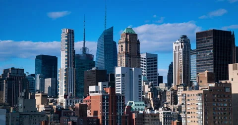 Lockdown Time Lapse Shot Of Skyscrapers And Towers In Downtown City Against Blue Stock Footage 237138397