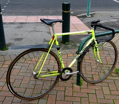 Locked Bicycle With Droop Handlebars Stock Photos
