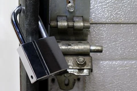 Locked chrome padlock Stock Photos