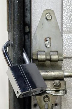 Locked chrome padlock Stock Photos