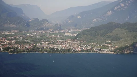 Locked down real time shot of lake Garda and mountains. Lake Garda is the Stock Footage 122288541