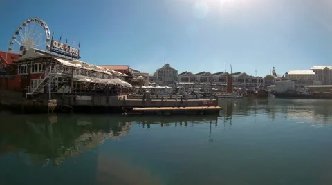Locked down shot of V&amp;A Waterfront in Cape Town with ferris wheel. Stock Footage 63097599