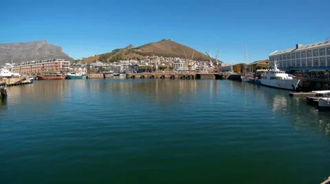 Locked down shot of V&amp;A Waterfront in Cape Town with ferris wheel. Stock Footage 63139672