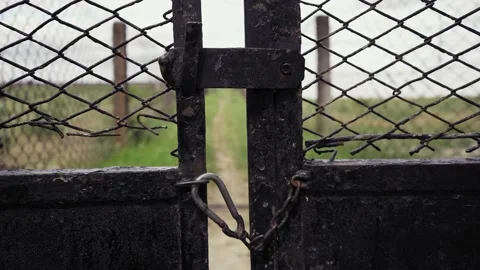 Locked gate. Private property under lock and key. Limited access. Stock-Footage 165740910