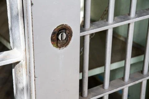 Locked jail cell Foto stock