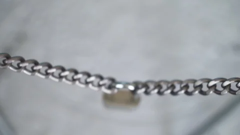 Locked lock chain to open show key Stock Footage 87215187