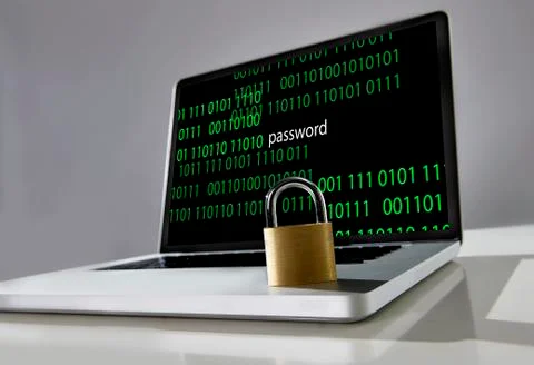 Locked lock on keyboard of computer laptop with binary code and password text Stock Photos