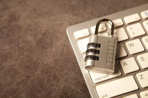 Locked padlock on a computer keyboard. Cyber security concept. 写真素材