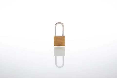 Locked padlock as security or privacy concept, isolated on white background w Stock Photos