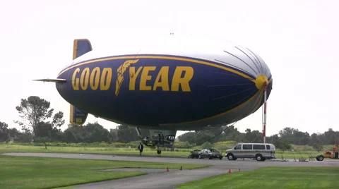Locked off shot of Good Year Blimp's starboard side Stock Footage 6617629