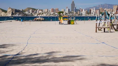 Locked shot of Parceled beach to keep distances and closed playgrounds Video stock 140559107