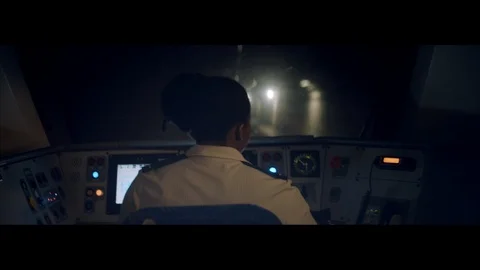 Locked off shot of a train driver Stock Footage 89775012