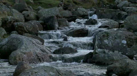 Locked-off shot of water flowing down small stream Video stock 508060