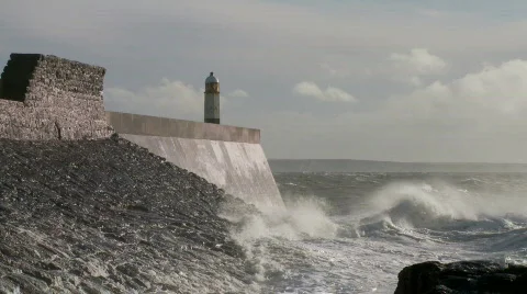 Locked off shot of waves breaking over sea wall Video stock 507867
