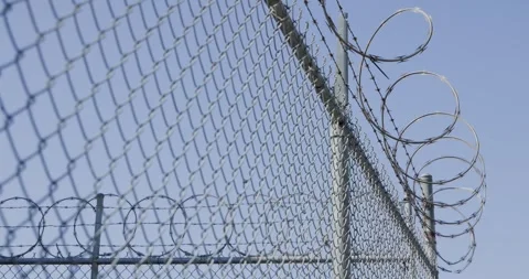 Locked Off Static Razor Wire and Chain Link Fence Stock Footage 250161517