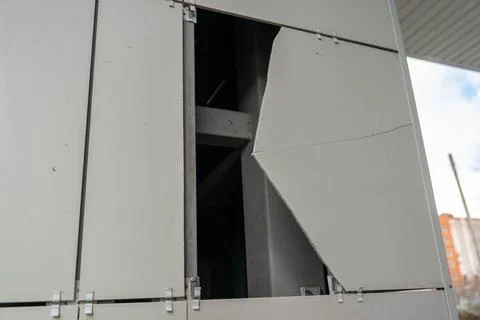 Locker with broken door at a storage facility during the day in an urban area Stock Photos