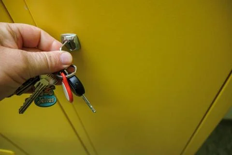 A locker is unlocked with a key 写真素材