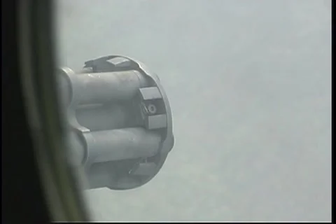 Lockheed AC-130 hercules gunship in flight firing its gun Stock Footage 51438295