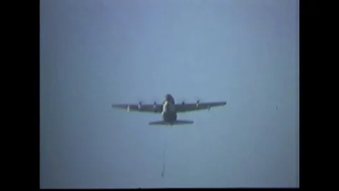 Lockheed C-130 Hercules aircraft flies in air - 1969 Vidéo 91263737