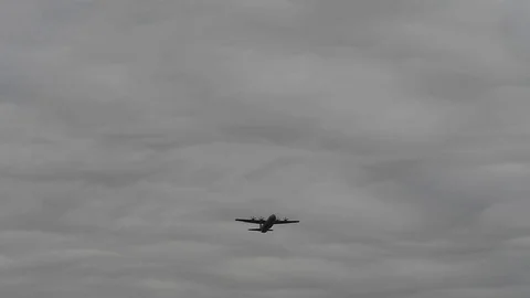 Lockheed C-130 Hercules drop cargo with parachute - 2017 Stock Footage 92305004