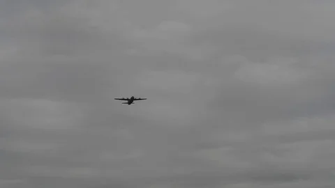 Lockheed C-130 Hercules drop cargo with parachute - 2017 Stock Footage 92305007