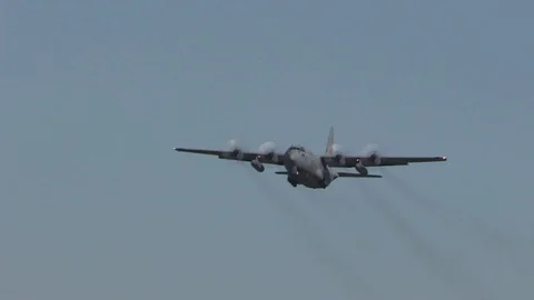 Lockheed C-130 Hercules flies in mid-air - 2016 Stock Footage 89214967