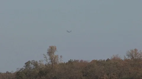 Lockheed C-130 Hercules flies in mid-air - 2016 Stock Footage 89215245