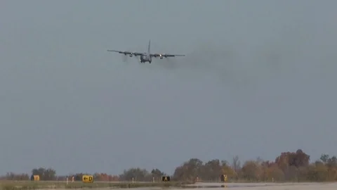 Lockheed C-130 Hercules lands on runway - 2016 Stock Footage 89214990