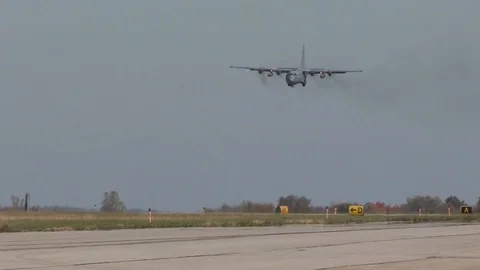 Lockheed C-130 Hercules lands on runway - 2016 Stock Footage 89215080