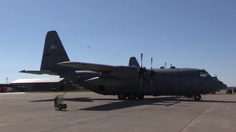 Lockheed C-130 Hercules parked in runway - 2016 Stock Footage 89215321