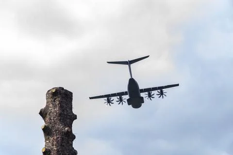 The Lockheed C-130 Hercules soars through the skies. An iconic military aircraft Stock Photos